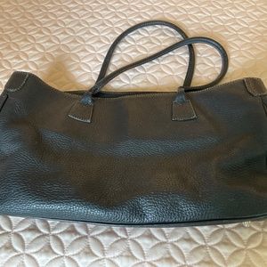 Guia’s Handbag